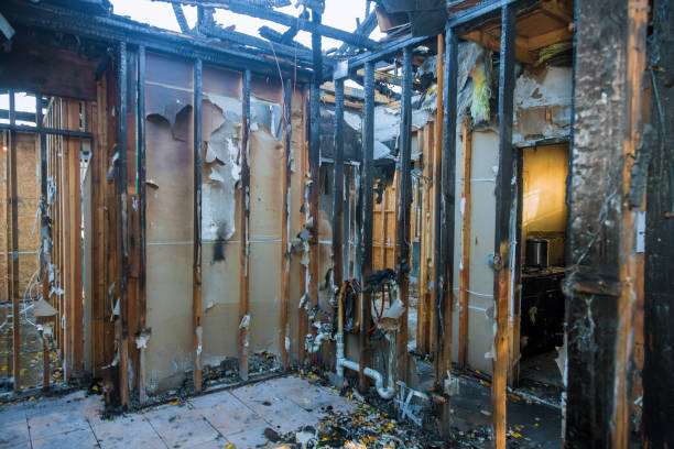 Professional Fire Damage Restoration technician working in Clancy, MT